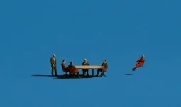 a woman ejected from a table 