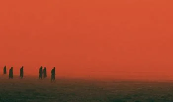 some people going into a red sea 