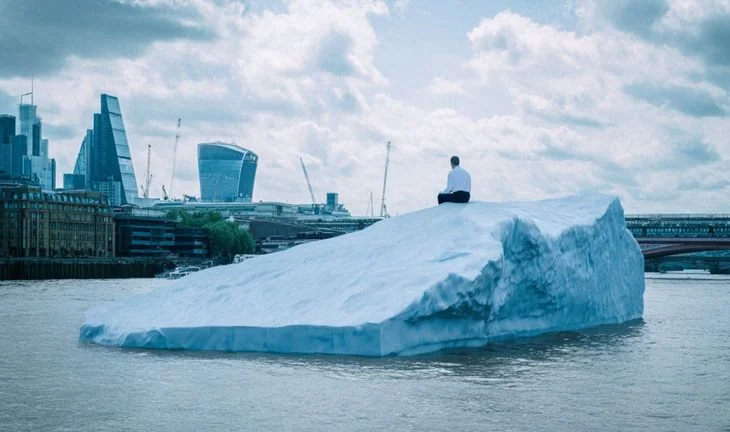 A little apprentice sitting on an iceberg on the Thames
